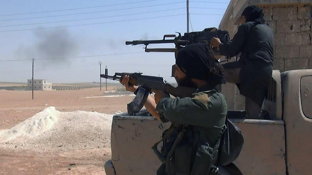 ISIS militants fighting in Aleppo (Photo: AP)