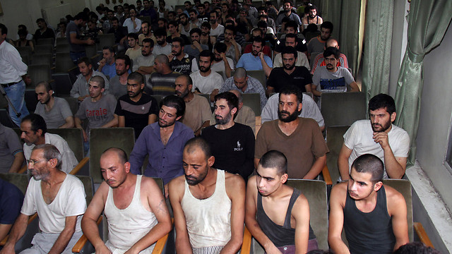 אלפים לא יצאו בחיים ממתקני הכליאה של כוחות הביטחון הסוריים (צילום: AP) (צילום: AP)
