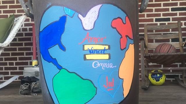 A painted trashcan showing solidarity with the Cohens