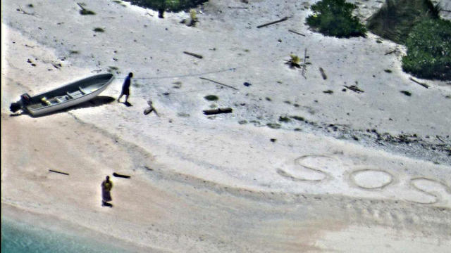 הכתובת על החול (צילום: EPA) (צילום: EPA)