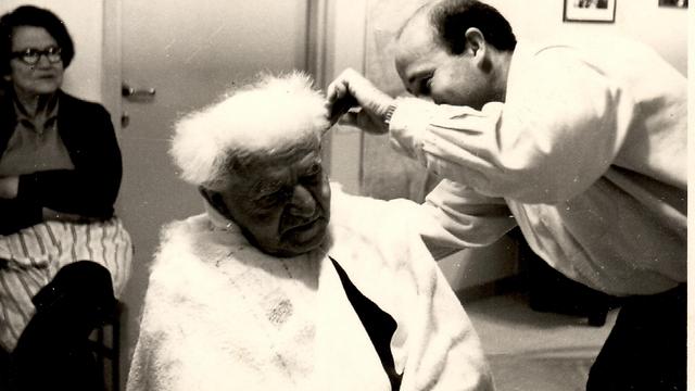 Ben-Gurion getting his hair cut by a sheep-shearer as wife Pola looks on, giving instructions (Photo: Rachel Goldberg)