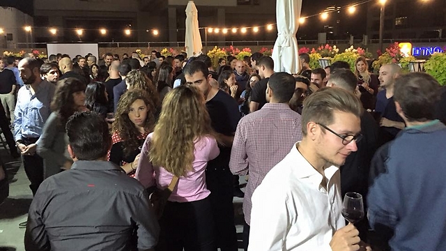 Participants at a rooftop Wine Wednesday event in Tel Aviv (Photo: Wine Wednesday)