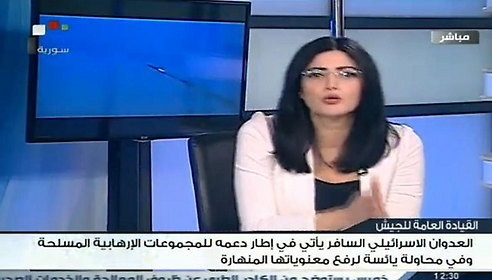 A Syrian news anchor covering the story