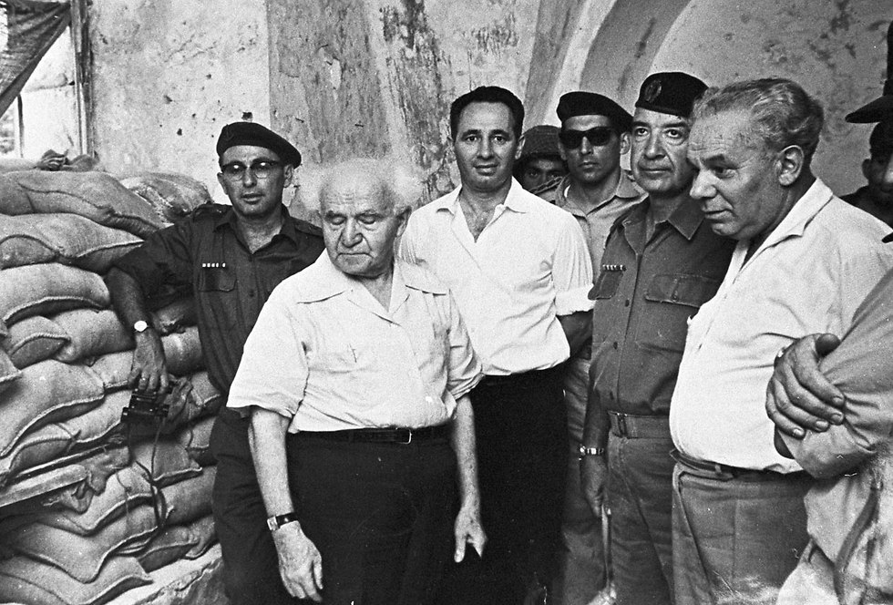 Israel's first Prime Minister David Ben-Gurion with Peres at his left (Photo: David Rubinger)