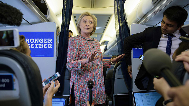 Clinton speaking to reporters (Photo: AFP)