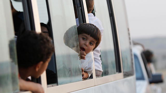 פליטים שברחו ממוסול  (צילום: רויטרס) (צילום: רויטרס)