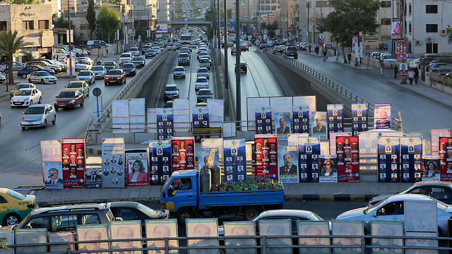 Election posters are on display in the capital, Amman (Photo: AP)