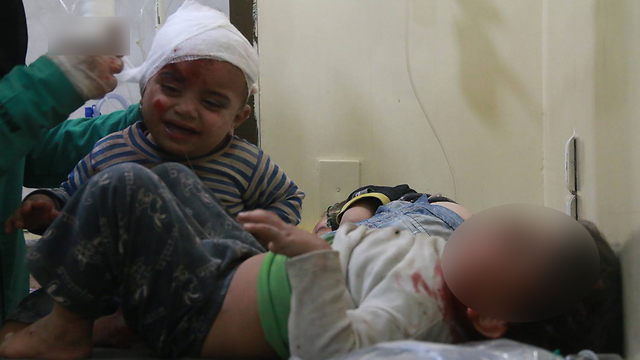 ילדים שנפצעו בהפגזות בסוריה ()