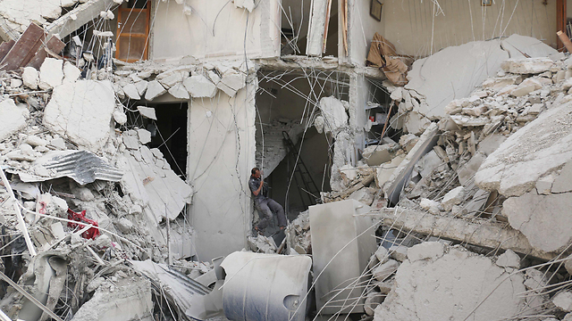 Destruction caused by an Assad regime airstrike in Aleppo (Photo: AFP)