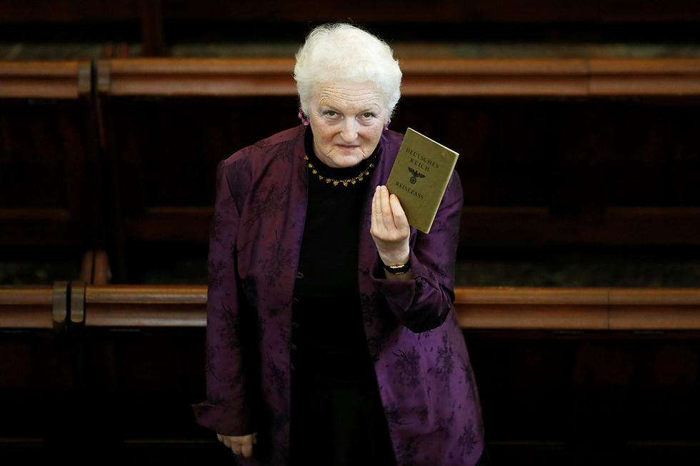 Julia Neuberger with her grandmother's J-stamped passport (Photo: Reuters)