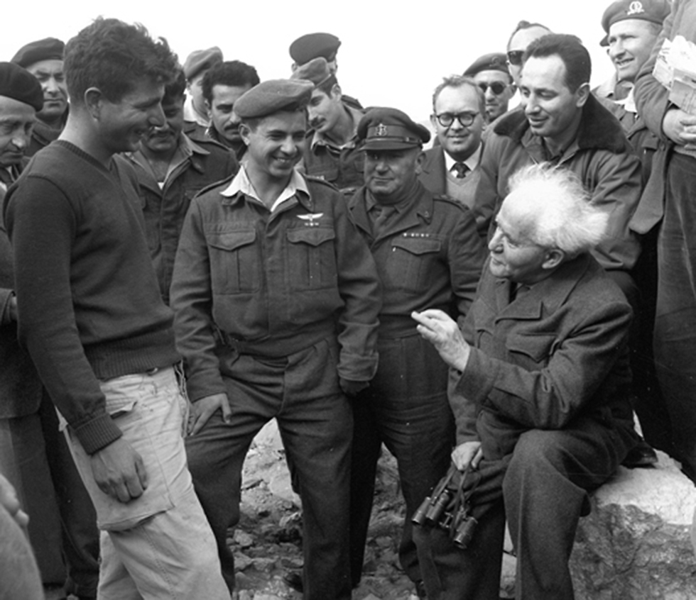 Shimon Peres accompanying David Ben-Gurion at a military visit (Photo: IDF Archive)