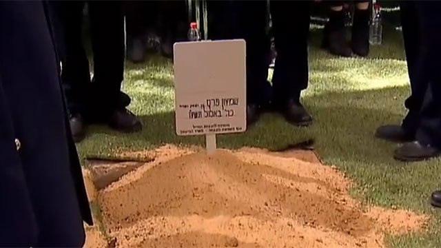Peres's fresh grave.