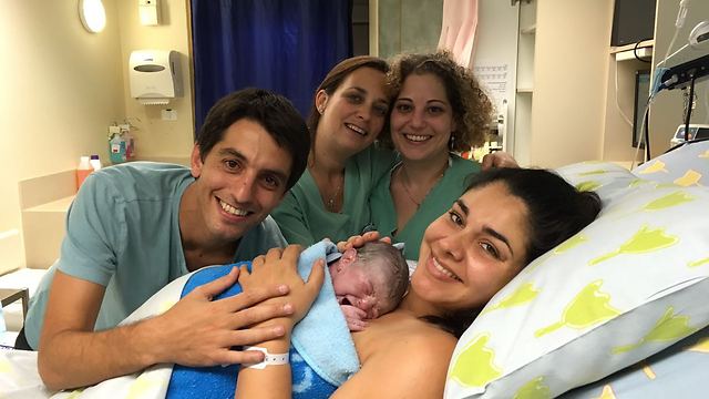 Adi and Tal ben Simon with the newest edition to their family 