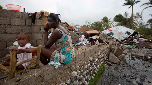 Haitians in the aftermath of the hurricane (Photo: AP)