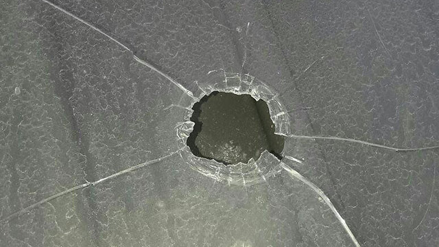 Bullet hole in Umm al-Fahm.
