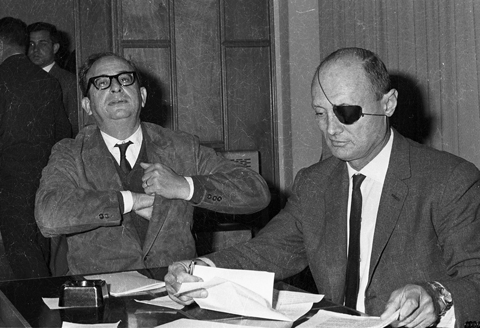Minister Moshe Dayan with Yitzhak Navon at the first Rafi Party convention, January 1964 (Photo: Dan Hadani, of the IPPA collection)
