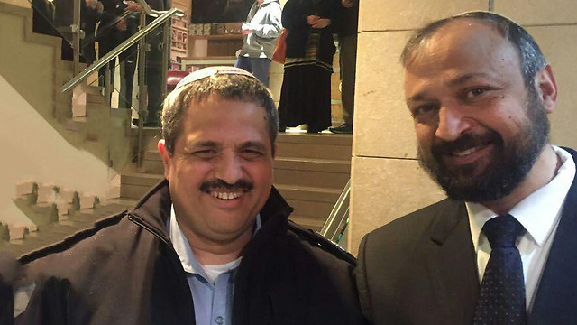 Rabbi Brachyahu, right, with Police Commissioner Roni Alsheikh.