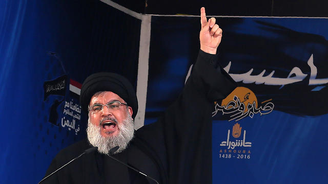 Nasrallah speaking at annual Ashura religious commemoration rally (Photo: AFP)