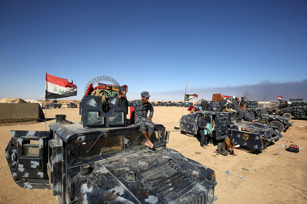 הכוחות העיראקיים מתמקמים בפתאי העיר, אתמול (צילום: AFP) (צילום: AFP)