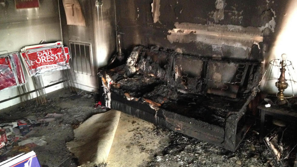 The burned GOP office in HIllsborough, NC. (Photo: AP)