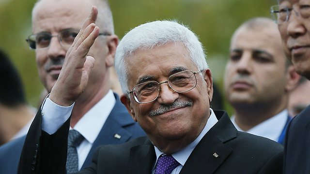 Abbas. Replaced the keffiyeh and weapon with a suit (Photo: AFP)   (Photo: AFP)