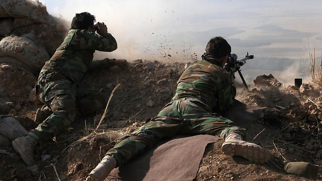 Coalition snipers set up outside a village on the outskirts of Mosul (Photo: Reuters)