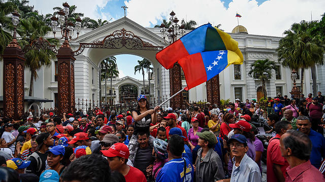 Protestors storming the Venezuelan Congress(Photo: AFP)