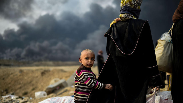 Fleeing the fighting in Mosul (Photo: AFP)