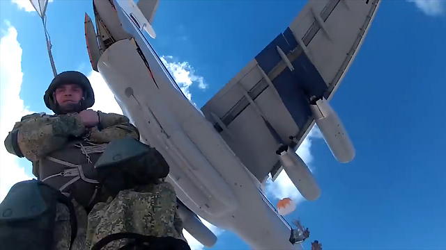 Russian paratrooper mid jump
