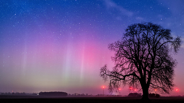 A long-time exposure of about 10 seconds shows the Aurora borealis in the night sky near Lietzen, Brandenburg, Germany. (Photo: EPA)