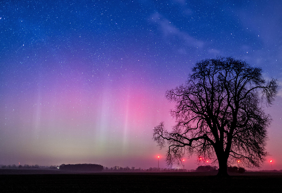 אורותיו הקסומים של הזוהר הצפוני נראים בלייצן גרמניה (צילום: EPA) (צילום: EPA)