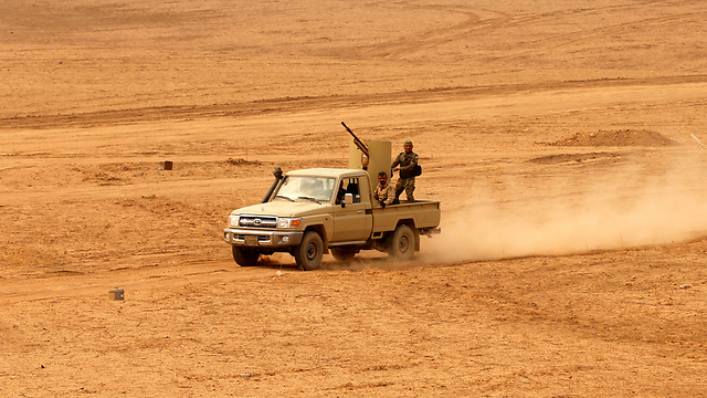 כוחות הפשמרגה הכורדים בדרך למוסול  (צילום: רויטרס) (צילום: רויטרס)