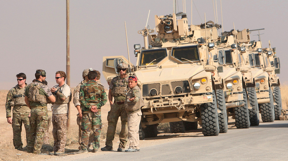 הכוחות העיראקיים בדרך למוסול הכבושה (צילום: רויטרס) (צילום: רויטרס)