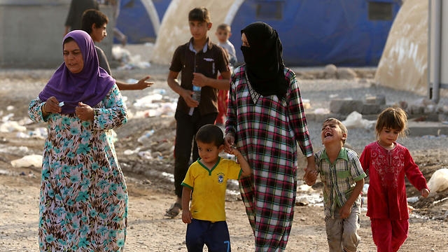 הפליטים החדשים של מוסול (צילום: AFP) (צילום: AFP)