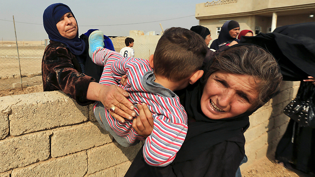 Refugees flee Mosul, Iraq. The world watches, knows and keeps quiet (Photo: AP) 