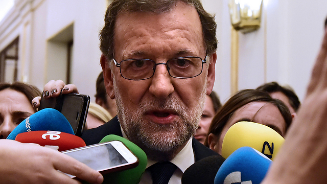 מריאנו רחוי, ראש ממשלת ספרד. קואליציות שבריריות (צילום: AFP) (צילום: AFP)