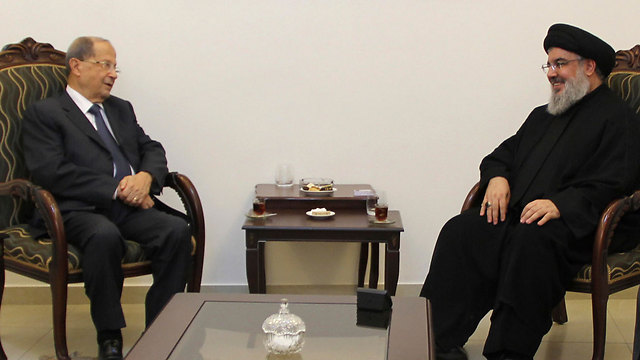 Aoun meets with Hezbollah leader Nasrallah (Photo: AP)