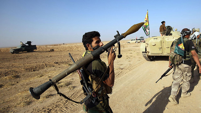כוחות שיעיים באזור מוסול (צילום: AFP) (צילום: AFP)