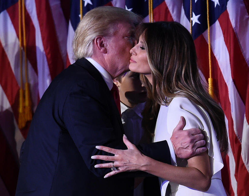 Trump with his wife Melania (Photo: AFP)