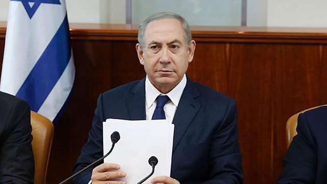 PM Netanyahu. Desires postponement of discussion on the Regulation Bill. (Photo: AFP)