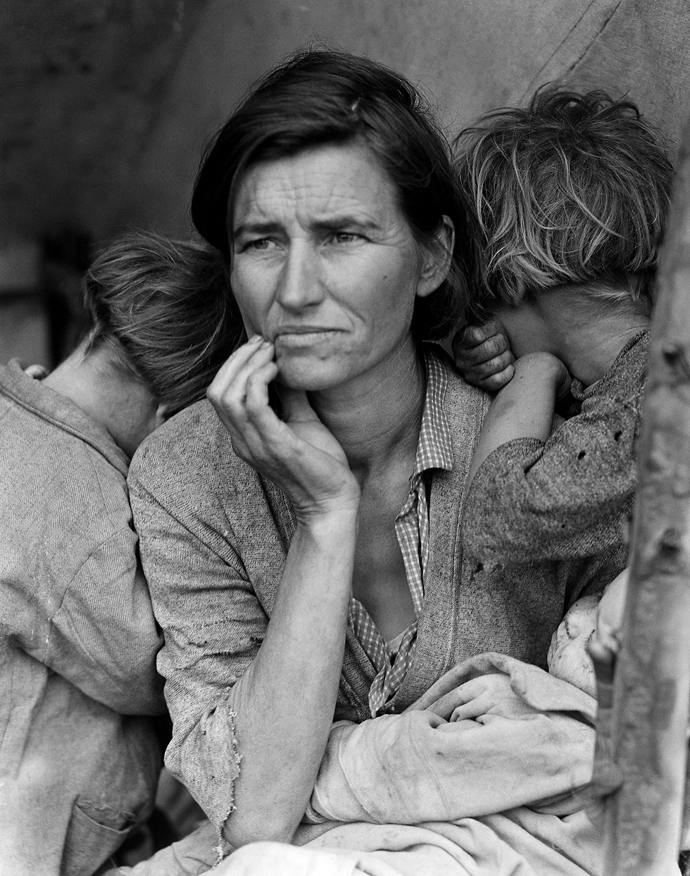 1936. "אמא מהגרת", בתקופת ההגירה ההמונית של חקלאי ארה"ב צפונה (צילום: דורותיאה לאנג) (צילום: דורותיאה לאנג)