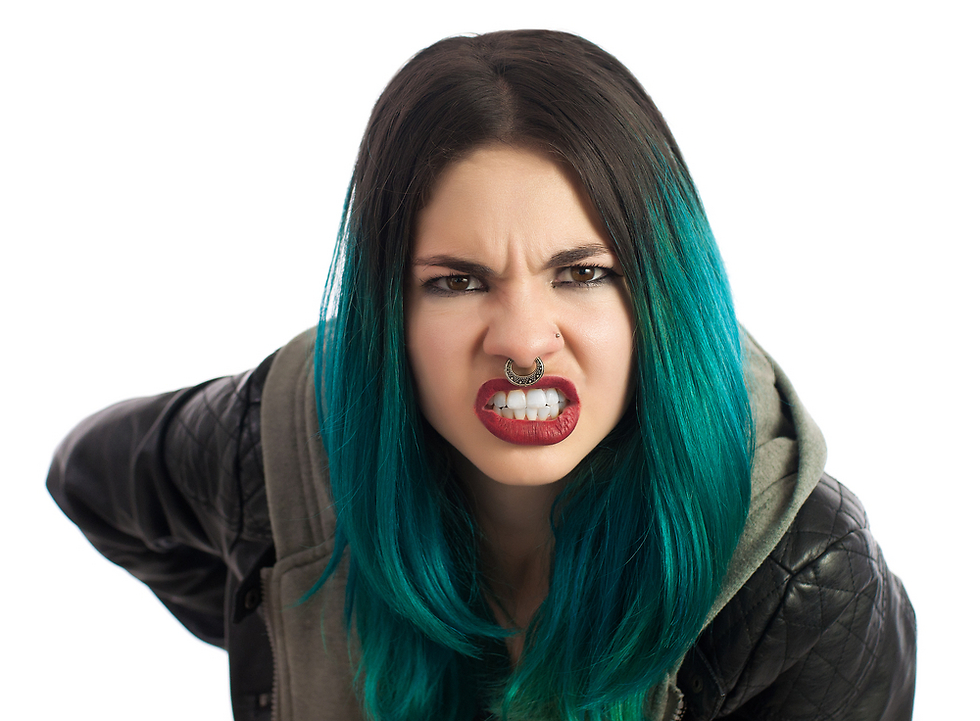 הבעת כעס מזעזעת יכולה להתרחש כשאנחנו לחוצים או סובלים מחרדה (צילום: Shutterstock) (צילום: Shutterstock)
