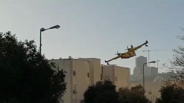 Foreign firefighting plane over Haifa