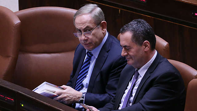 Prime Minister Netanyahu with Yisrael Katz (Photo: Alex Kolomoisky)