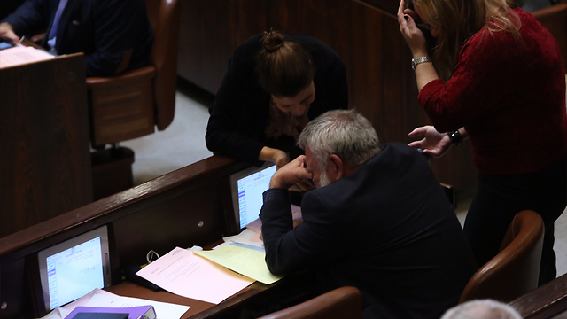 Ilan Gilon weeps with emotion after the vote (Photo: Gil Yohanan)