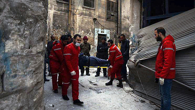 Injured in Aleppo (Photo: AP)