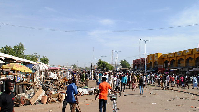בכניסה לשוק במיידוגורי, היום (צילום: AFP) (צילום: AFP)