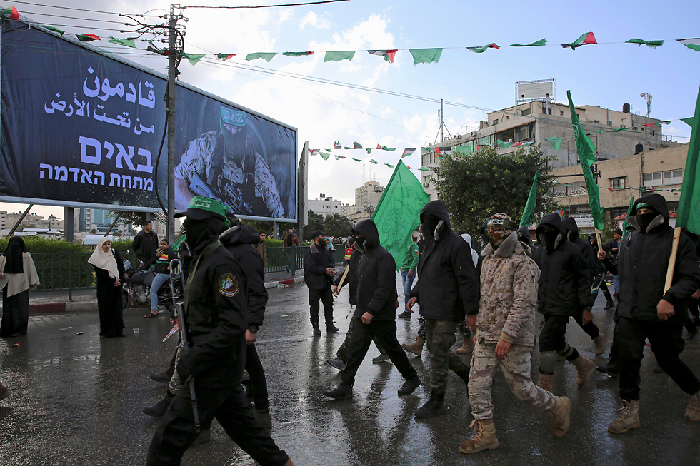 The large sign says in Hebrew and Arabic 'Coming from underground' (Photo: AP)