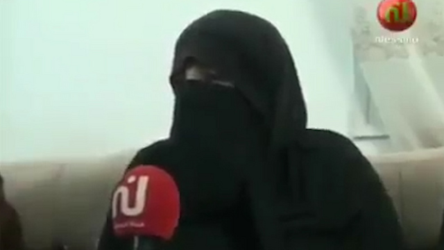 AL-Zahwar's wife being interviewed in Sfax