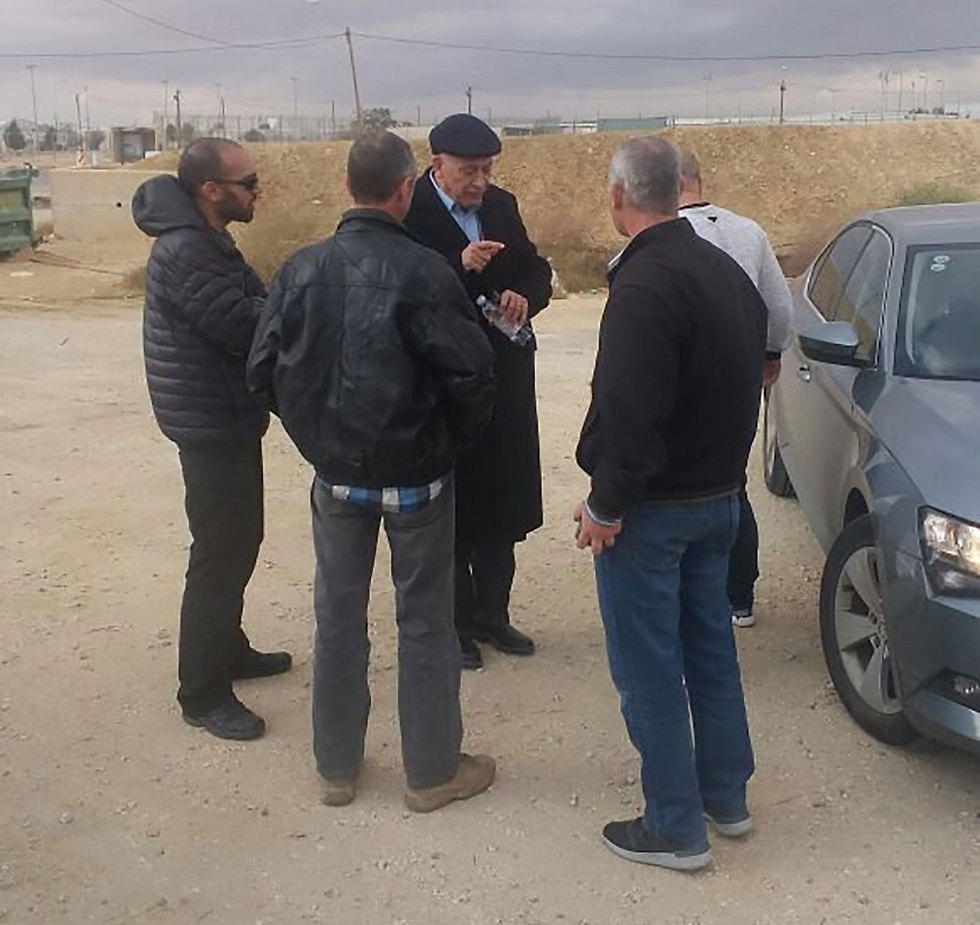 MK Ghattas with police outside of Ktzi'ot Prison